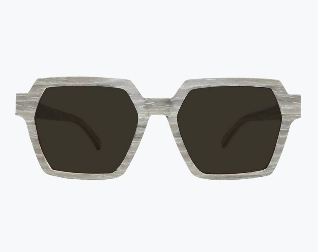 Gray wayframe wooden sunglasses made of silver oak with subtle black wood grain accents with dark gray lenses by NURILENS.