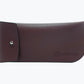Burgundy vegan leather pouch for eyeglasses with NURILENS logo embossed on the bottom left.