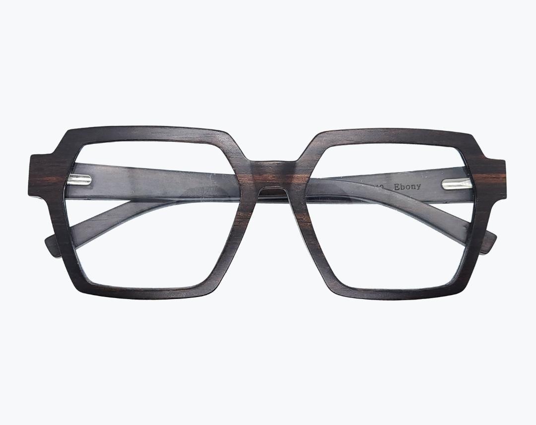 Folded pair of dark brown wayframe eyeglasses made of ebony with subtle black wood grain by NURILENS.