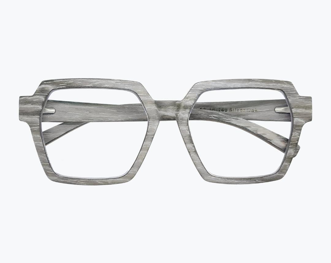 Folded pair of gray wayframe wooden eyeglasses made of silver oak with subtle black wood grain accents by NURILENS.