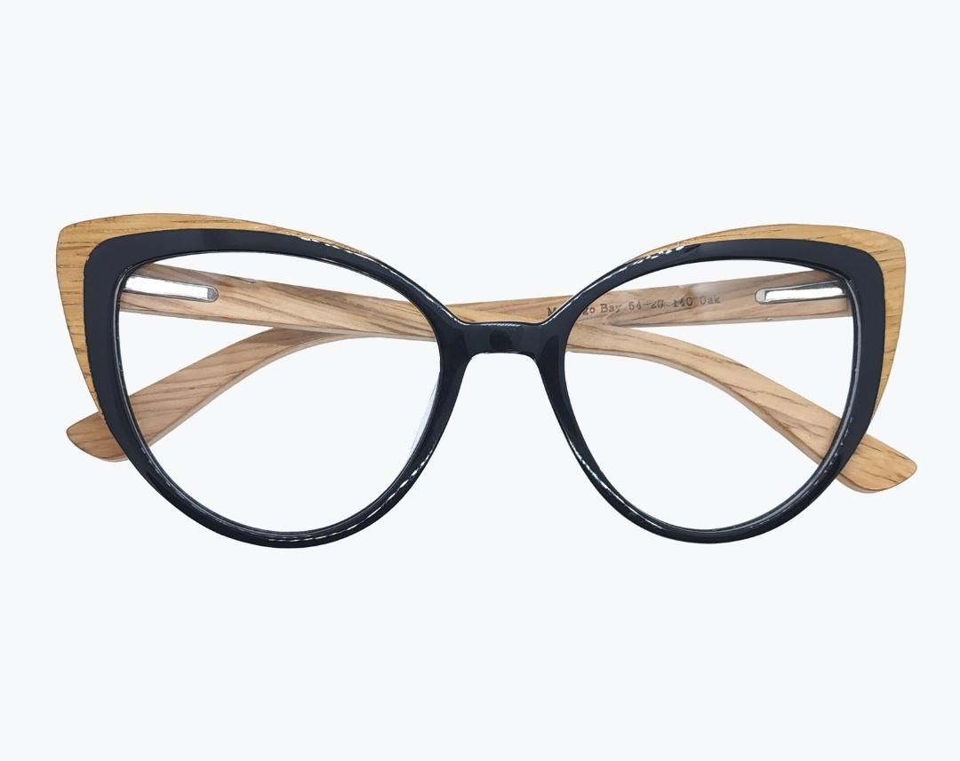 Folded wooden cat eye eyeglasses made of light brown oak and black acetate by NURILENS.