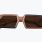 Folded brown and black rectangular wooden sunglasses with brown lenses made of black birch and brown kevazingo wood by NURILENS.