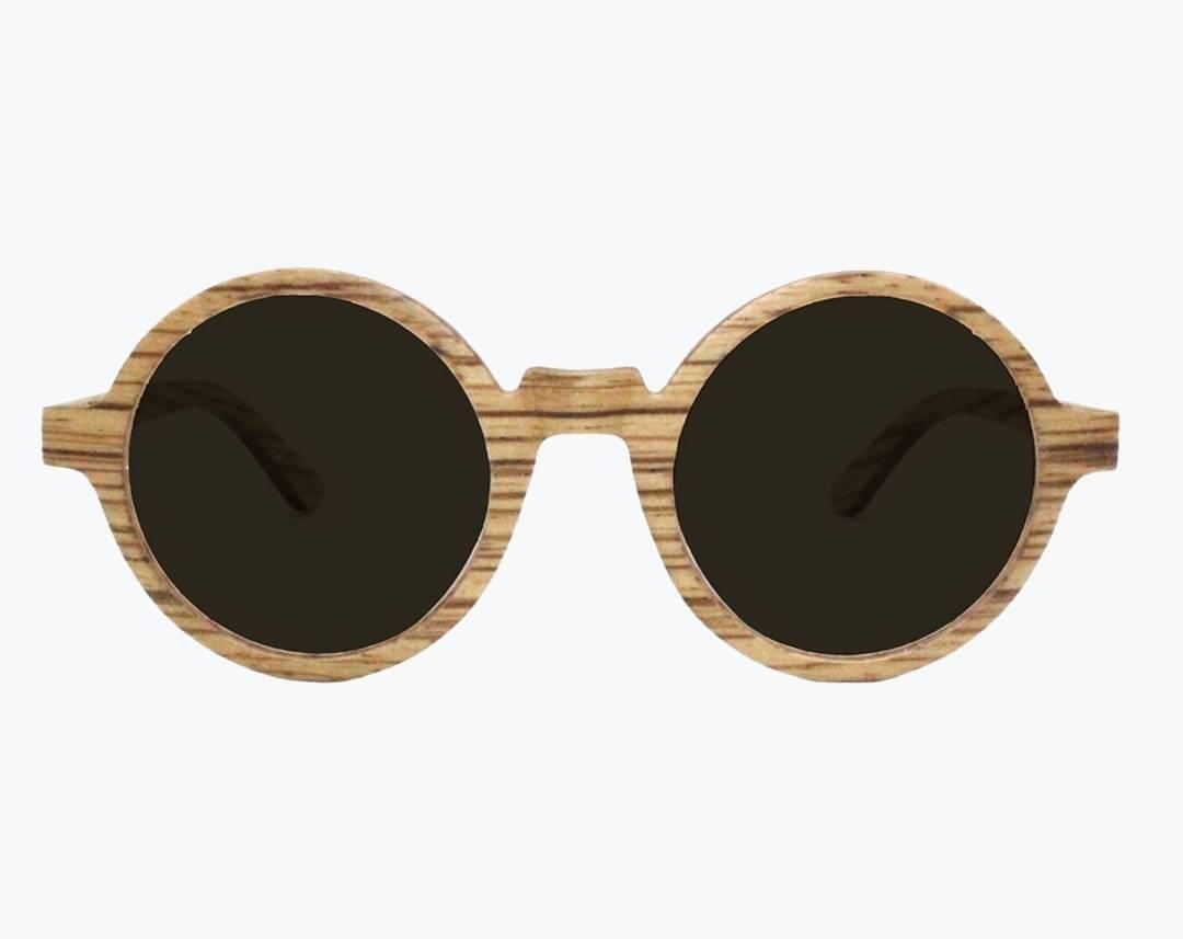 Round wooden sunglasses made of light brown Zebrawood with subtle black stripes with dark gray lenses by NURILENS.