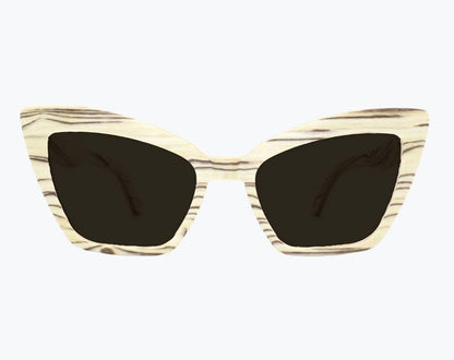 Beige cat eye wooden sunglasses made of ice wood with black striped wood grain accents with dark gray lenses by NURILENS.