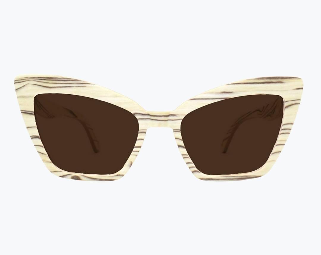 Beige cat eye wooden sunglasses made of ice wood with black striped wood grain accents with brown lenses by NURILENS.
