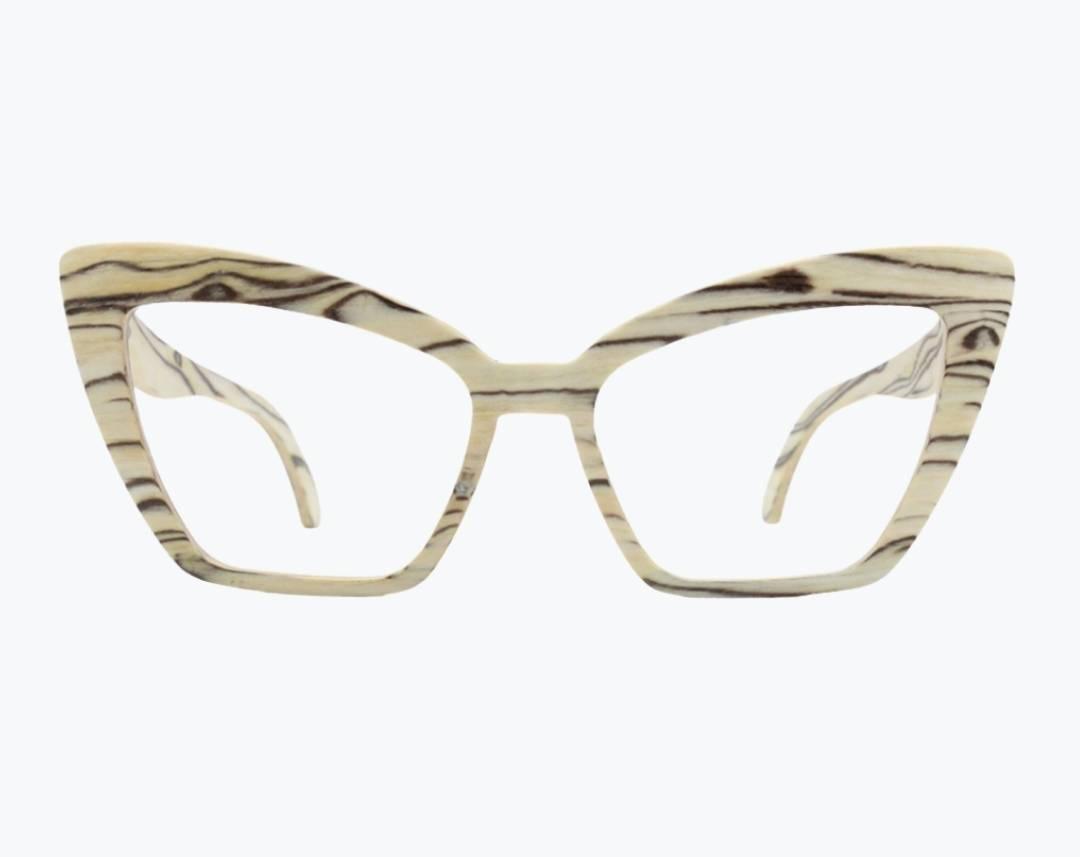 Beige cat eye wooden eyeglasses made of ice wood with black striped wood grain accents by NURILENS.